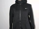 a woman ' s black nike hoodie jacket on a mannequin mannequin mannequin mannequin mannequin mannequin mannequin