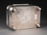 a silver suitcase that is sitting on a table