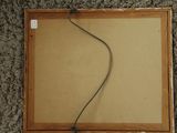 a picture of a picture hanging on a wall with a cord