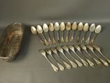 a lot of spoons that are sitting on a table