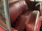 an image of a red car with leather seats
