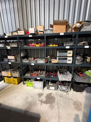 many boxes and boxes on the shelves in the warehouse