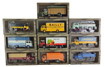 de nombreux types de camions jouets dans une vitrine
