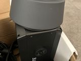 a box with a laptop and a cup in it