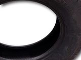 a close up of a tire on a white background with a white background