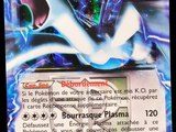 un gros plan d'une carte sur laquelle figure l'image d'un Pokémon