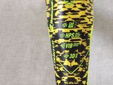 a yellow and black baseball bat with a black and yellow design on it