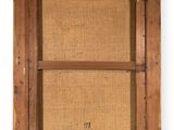 a close up of a picture of a wooden frame on a wall