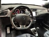 the interior of a car with a steering wheel and dashboard controls