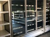 many empty shelves in a store with empty shelves