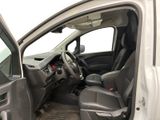 the interior of a car with the door open and the driver ' s seat down