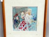 framed picture of a painting of a woman and a bird in a garden