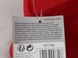 the back of a red teddy bear with a tag on it ' s neck
