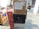 many boxes stacked on top of each other in a store