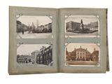 an open book with pictures of old buildings on it