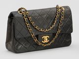 a chanel black quilted lambskin and gold chain shoulder bag