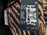 an image of a close up of a tie with a label on it