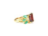 an image of a gold ring with a garnet and emerald stones