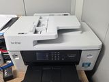 a printer that is sitting on top of a desk