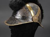 a close up of a helmet on a mannequin head