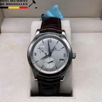 a watch that is sitting in a box on the table