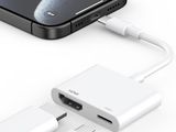 an image of a close up of a cell phone with a charger attached to it