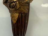 a picture of a decorative object on a white surface