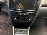 a picture of a car dashboard with a digital display