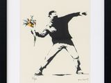 framed print of a man with a bouquet of flowers throwing a frisbee