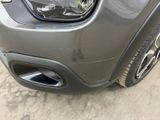 a close up view of a car ' s front bumper