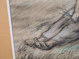 a drawing of a person sitting on the ground with a pair of shoes