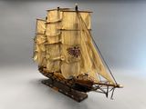 une maquette de voilier exposée sur une table