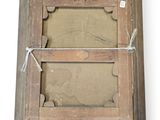 an old picture frame with a rope around it and a piece of paper in the middle of the frame