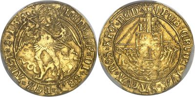 a close up of two gold coins on a white surface