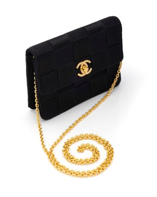 chanel black quilted leather clutch bag