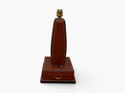 an image of a brown table lamp on a white background