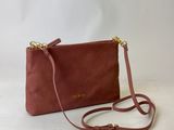 the small cross body bag in burgundy sued with gold hardware
