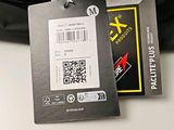 a black bag with a qr code attached to it