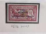 four different types of stamps are on display in a display case