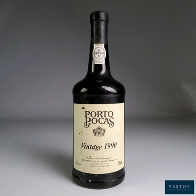 a bottle of wine that is sitting on a table