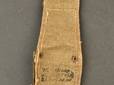 a close up of a small piece of cloth with a tag on it