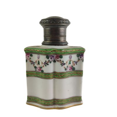 an image of a white and green vase with flowers on it