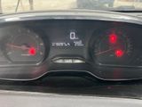 a close up of a car dashboard with a speedometer and gauges