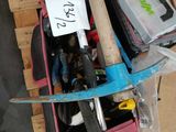 a pile of tools sitting on top of a wooden pallet