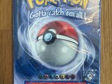 Le jeu de cartes à collectionner Pokémon est exposé sur la table.