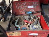 a red box with a bunch of tools inside of it