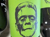 a bottle of wine with a picture of a man on it