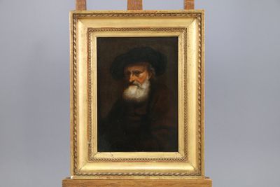 an old painting of a bearded man with a beard and a hat on a wooden easel