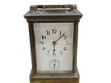a small clock that is sitting on a table