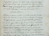 a close up of a piece of paper with writing on it